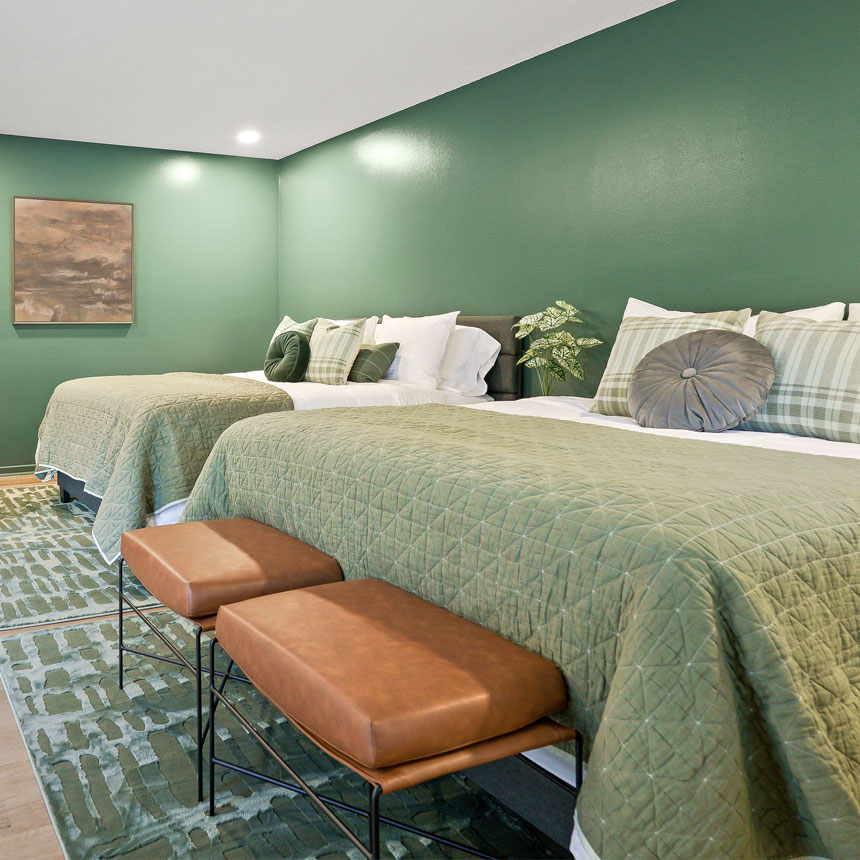 Nice cozy bedroom with green accents